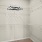 closet space with multiple-tier shelving